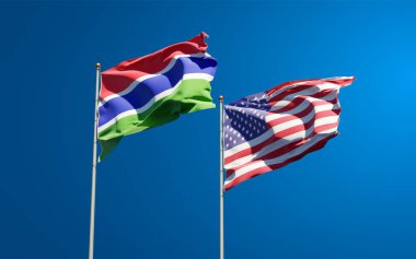 Gambiya ve ABD 'nin güzel ulusal bayrakları gökyüzünde birlikte. 3B sanat eseri konsepti. 