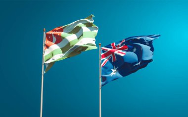 Avustralya ve Abhazya 'nın güzel ulusal bayrakları gökyüzü arka planında birlikte. 3B sanat eseri konsepti. 