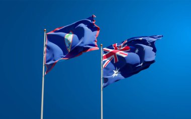 Avustralya ve Guam 'ın güzel ulusal bayrakları gökyüzü arka planında birlikte. 3B sanat eseri konsepti. 