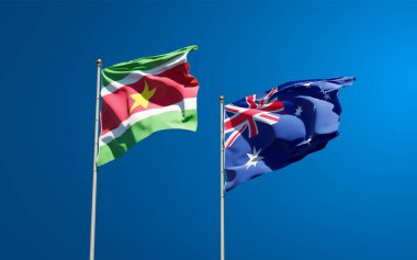 Surinam ve Avustralya 'nın güzel ulusal bayrakları gökyüzü arka planında birlikte. 3B sanat eseri konsepti. 