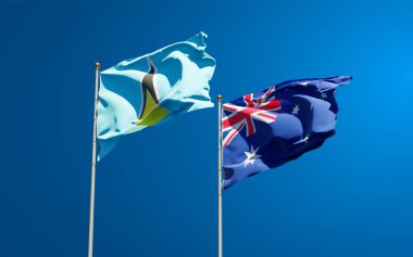 Gökyüzü arka planında Saint Lucia ve Avustralya 'nın güzel ulusal bayrakları. 3B sanat eseri konsepti. 