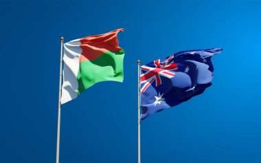Madagaskar ve Avustralya 'nın güzel ulusal bayrağı gökyüzü arka planında birlikte. 3B sanat eseri konsepti. 
