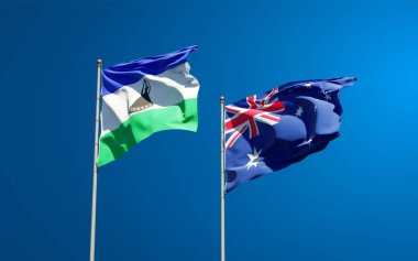 Lesotho ve Avustralya 'nın güzel ulusal bayrakları gökyüzü arka planında birlikte. 3B sanat eseri konsepti. 