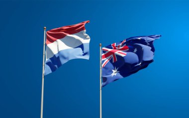 Hollanda ve Avustralya 'nın güzel ulusal bayrakları gökyüzü arka planında birlikte. 3B sanat eseri konsepti. 