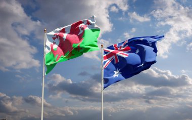 Galler ve Avustralya 'nın güzel ulusal bayrakları gökyüzü arka planında birlikte. 3B sanat eseri konsepti. 