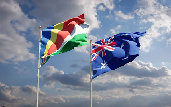 Seyşeller ve Avustralya 'nın güzel ulusal bayrakları gökyüzü arka planında birlikte. 3B sanat eseri konsepti. 