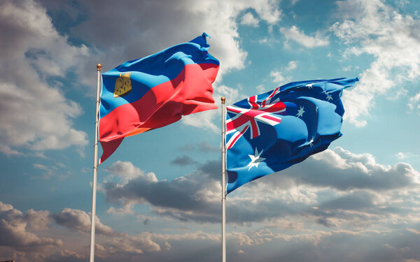 Красивые национальные государственные флаги Лихтенштейна и Австралии вместе на фоне неба. Концепция 3D оформления. 