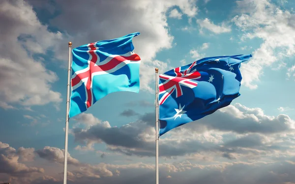 İzlanda ve Avustralya 'nın güzel ulusal bayrağı gökyüzü arka planında birlikte. 3B sanat eseri konsepti. 