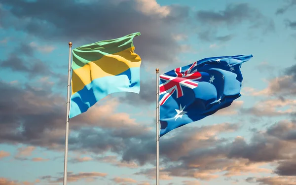 Hermosas Banderas Estatales Nacionales Gabón Australia Juntas Fondo Del Cielo — Foto de Stock