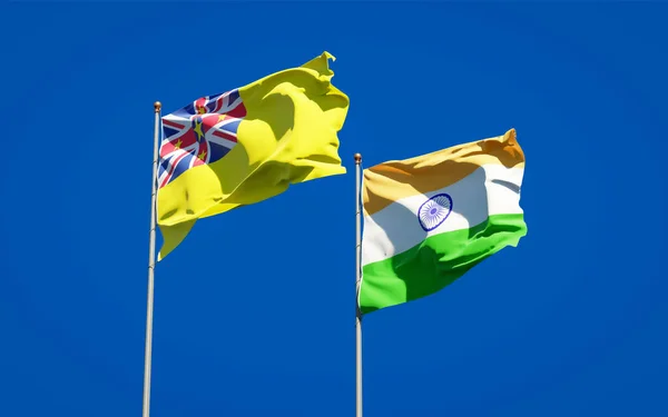 Красивые Национальные Государственные Флаги Ниуэ Индии Вместе Фоне Неба Концепция — стоковое фото