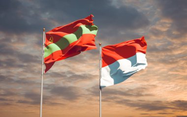 Transnistria ve Endonezya 'nın güzel ulusal bayrağı gökyüzü arka planında birlikte. 3B sanat eseri konsepti. 