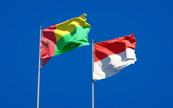 Красивые Национальные Государственные Флаги Индонезии Гвинеи Бисау Вместе Фоне Неба — стоковое фото