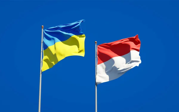 우크라이나와 인도네시아의 아름다운 깃발들이 하늘을 배경으로 — 스톡 사진