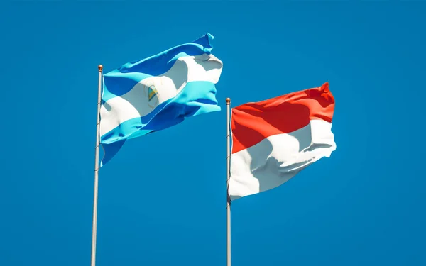 Belle Bandiere Nazionali Stato Del Nicaragua Indonesia Insieme Sullo Sfondo — Foto Stock