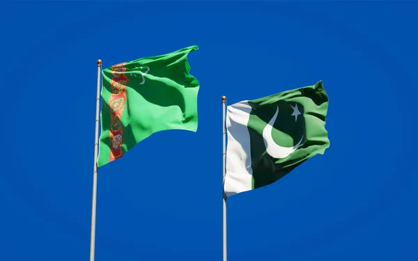 Krásné Národní Státní Vlajky Turkmenistánu Pákistánu Společně Pozadí Oblohy Koncept — Stock fotografie