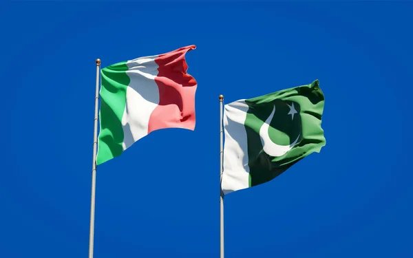 Beautiful national state flags of Italy and Pakistan together at the sky background. 3D artwork concept.