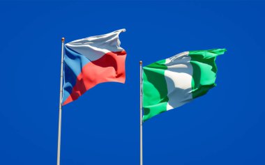 Nijerya 'nın ve Çek' in güzel ulusal bayrakları gökyüzü arka planında birlikte. 3B sanat eseri konsepti. 