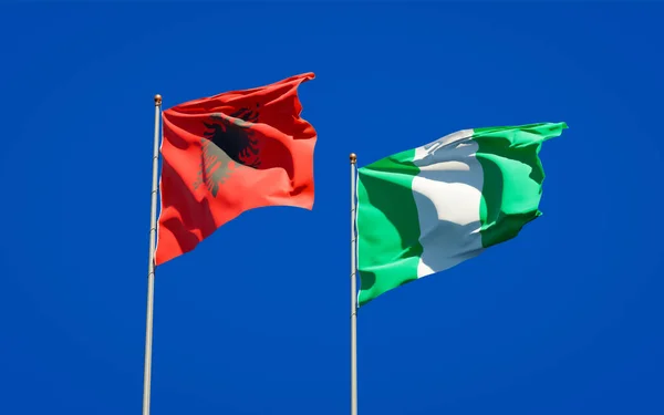 Piękne Flagi Państwowe Nigerii Albanii Razem Tle Nieba Koncepcja Grafiki — Zdjęcie stockowe