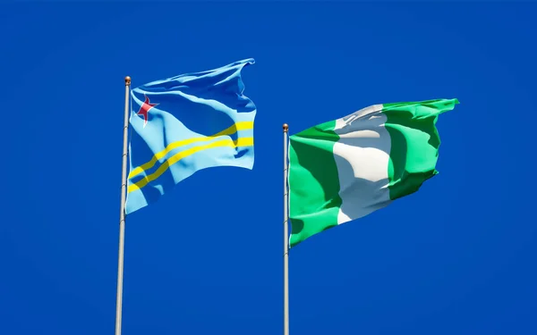 Hermosas Banderas Estatales Nacionales Nigeria Aruba Juntas Fondo Del Cielo — Foto de Stock