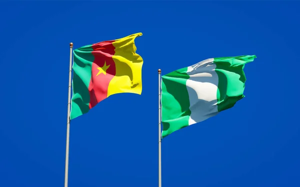 空の背景で一緒にナイジェリアとカメルーンの美しい国家旗 3Dアートワークコンセプト — ストック写真