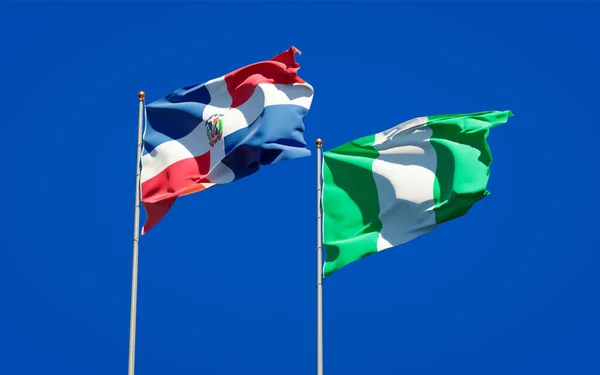 Prachtige Nationale Staatsvlaggen Van Nigeria Dominicaanse Republiek Samen Achtergrond Kunstwerkconcept — Stockfoto