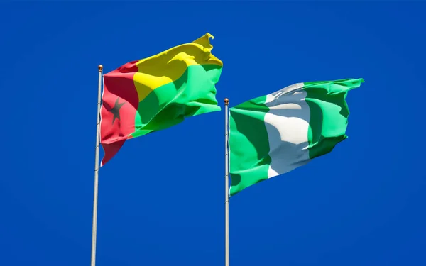 Gökyüzü Arka Planında Nijerya Gine Bissau Nun Güzel Ulusal Bayrakları — Stok fotoğraf