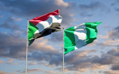 Sudan ve Nijerya 'nın güzel ulusal bayrakları gökyüzü arka planında birlikte. 3B sanat eseri konsepti. 