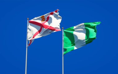 Jersey ve Nijerya 'nın güzel ulusal bayrakları gökyüzünde birlikte. 3B sanat eseri konsepti. 