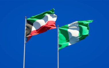 Kuveyt ve Nijerya 'nın güzel ulusal bayrağı gökyüzü arka planında birlikte. 3B sanat eseri konsepti. 