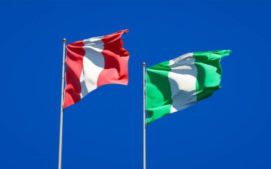 Peru ve Nijerya 'nın güzel ulusal bayrağı gökyüzü arka planında birlikte. 3B sanat eseri konsepti. 