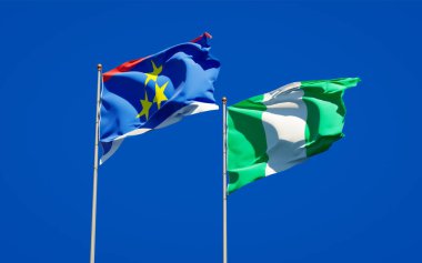 Gökyüzü arka planında Voyvodina ve Nijerya 'nın güzel ulusal bayrakları birlikte. 3B sanat eseri konsepti. 