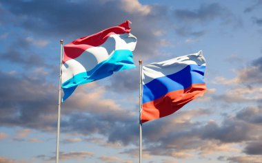 Lüksemburg ve Rusya 'nın güzel ulusal bayrakları gökyüzü arka planında birlikte. 3B sanat eseri konsepti. 