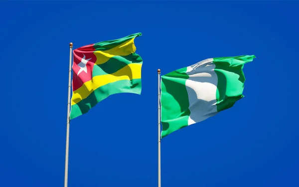 Togo Nigéria Gyönyörű Nemzeti Zászlói Együtt Hátterében Művészeti Koncepció — Stock Fotó