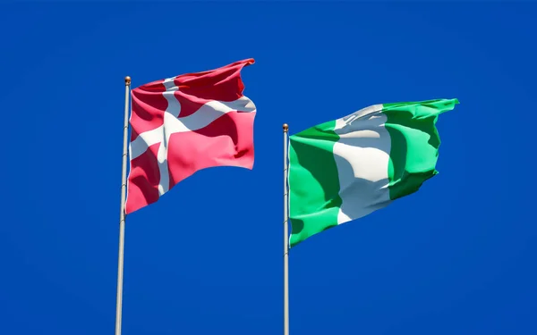 Hermosas Banderas Estatales Nacionales Dinamarca Nigeria Juntas Fondo Del Cielo —  Fotos de Stock