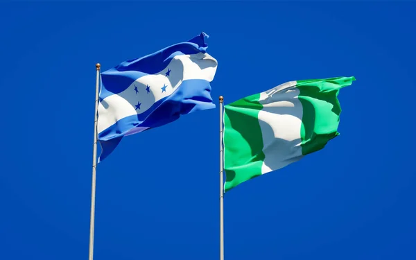 Hermosas Banderas Estatales Nacionales Honduras Nigeria Juntas Fondo Del Cielo —  Fotos de Stock