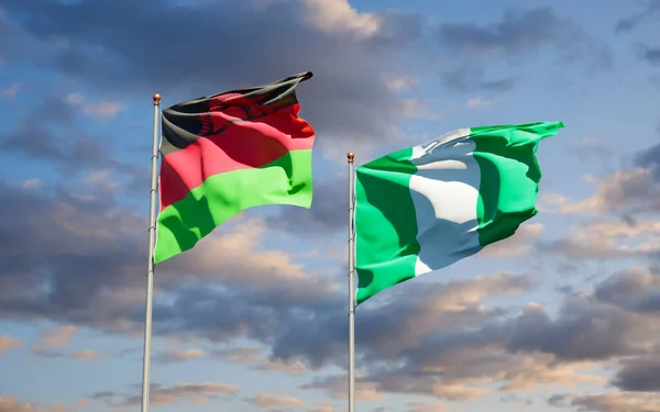 Belas Bandeiras Estatais Nacionais Malawi Nigéria Juntas Fundo Céu Conceito — Fotografia de Stock