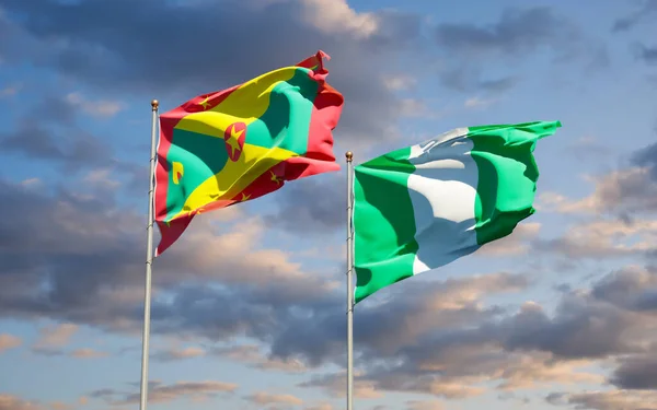 Grenada Nijerya Nın Güzel Ulusal Bayrakları Gökyüzü Arka Planında Birlikte — Stok fotoğraf
