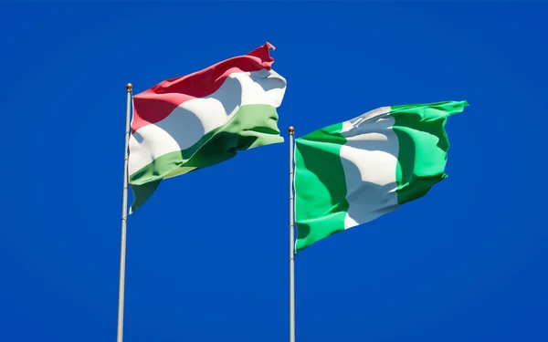 Hermosas Banderas Estatales Nacionales Hungría Nigeria Juntas Fondo Del Cielo —  Fotos de Stock