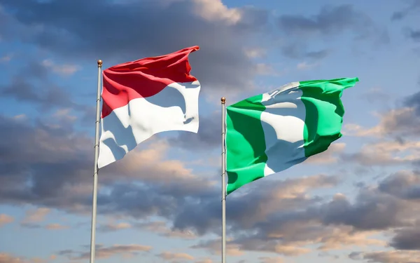 Gökyüzü Arka Planında Monako Nijerya Nın Güzel Ulusal Bayrakları Birlikte — Stok fotoğraf