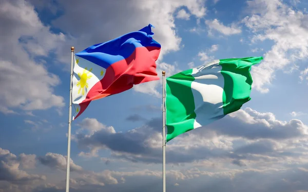 Gökyüzü Arka Planında Filipinler Nijerya Nın Güzel Ulusal Bayrakları Birlikte — Stok fotoğraf