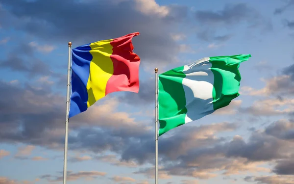 Belas Bandeiras Nacionais Romênia Nigéria Juntas Fundo Céu Conceito Arte — Fotografia de Stock