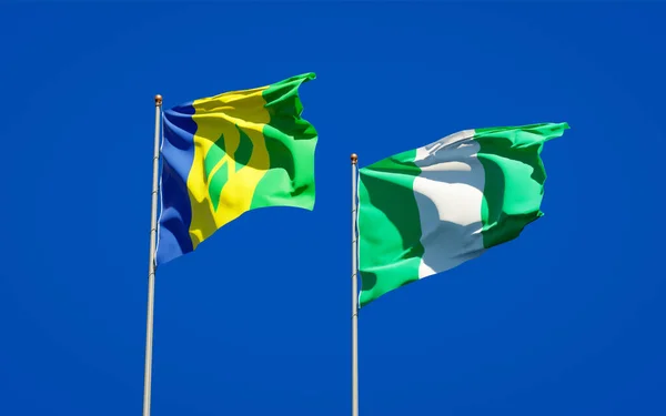 Piękne Flagi Państwowe Saint Vincent Grenadyny Nigerii Razem Tle Nieba — Zdjęcie stockowe