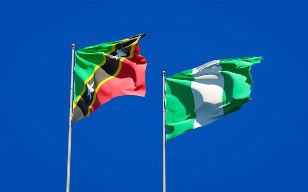 美丽的圣基茨和尼维斯以及尼日利亚国旗在天空的背景下齐聚一堂 3D艺术品概念 — 图库照片