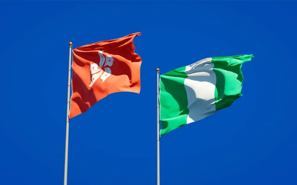 美丽的香港和尼日利亚国旗在天空的背景下相映成趣 3D艺术品概念 — 图库照片