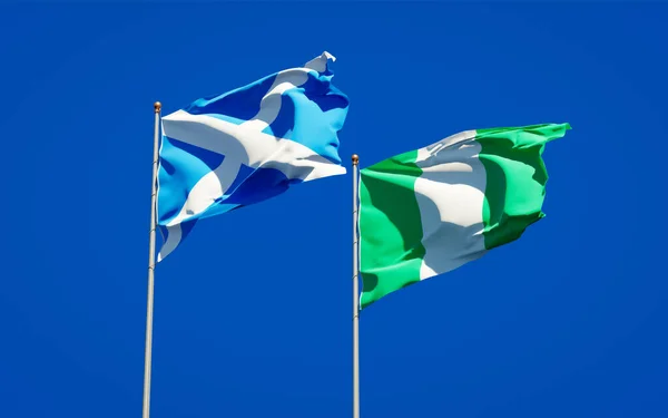 Hermosas Banderas Estatales Nacionales Escocia Nigeria Juntas Fondo Del Cielo —  Fotos de Stock