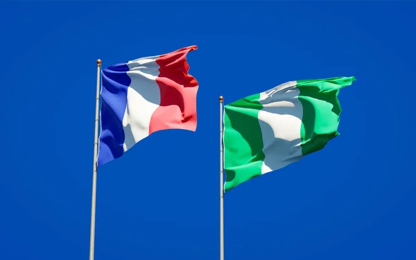 Belle Bandiere Nazionali Stato Francia Nigeria Insieme Sullo Sfondo Del — Foto Stock