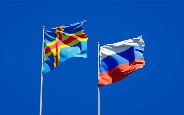Vackra Nationella Flaggor Ryssland Och Åland Tillsammans Himlen Bakgrund Konstverkskoncept — Stockfoto