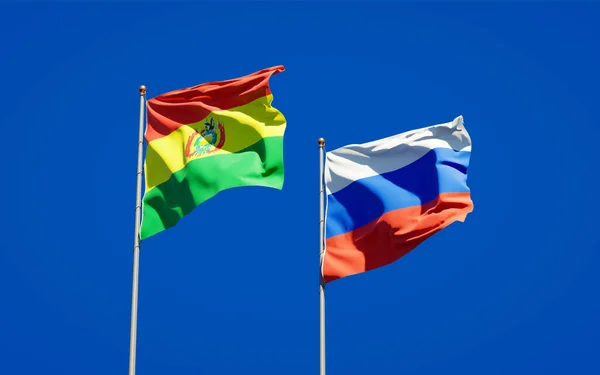 Prachtige Nationale Staatsvlaggen Van Rusland Bolivia Samen Achtergrond Kunstwerkconcept — Stockfoto