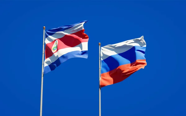 Piękne Flagi Państwowe Rosji Kostaryki Razem Tle Nieba Koncepcja Grafiki — Zdjęcie stockowe