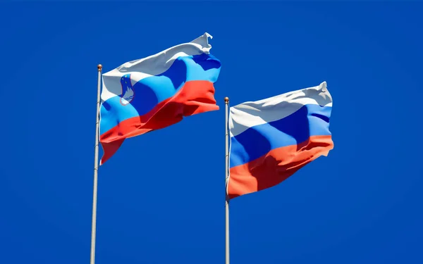 Prachtige Nationale Staatsvlaggen Van Slovenië Rusland Samen Achtergrond Kunstwerkconcept — Stockfoto